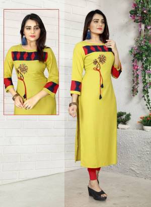 Flaunt Your Rich And Elegant Taste Wearing This Designer Readymade Kurti In Yellow Color. This Elegant Looking Kurti Is Fabricated On Rayon. It Is Light Weight, Durable And Easy To Care For.
