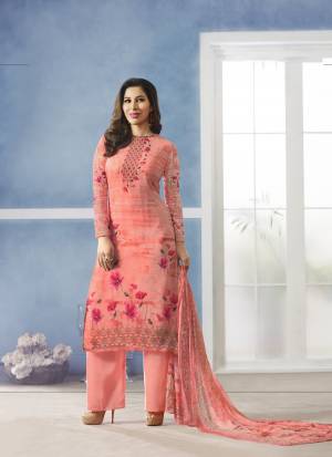 A Must Have Shade In Every Womens Wardrobe Is Here With this Semi-stitched Suit In Peach Color Paired With Peach Colored Bottom And dupatta. Its Top Is Fabricated On Georgette Paired with Santoon Bottom And Chiffon Dupatta. It Has Lovely Prints And Embroidery Which Is Making The Suit Attractive. Buy This Suit Now.