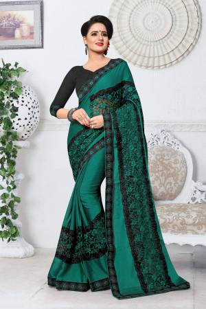 New Shade In Green Is Here With This Designer Saree In Teal Green Color Paired With Black Colored Blouse. This Saree Is Fabricated On Silk Paired With Art Silk Fabricated Blouse. It Has Attractive Resham Embroidery With Stone Work, Buy This Saree Now.