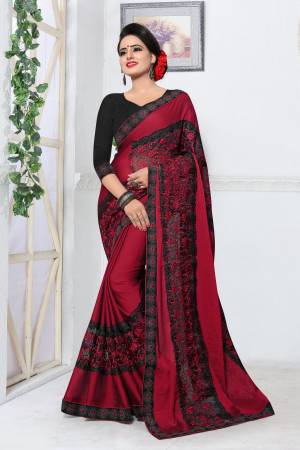For A Royal Look, Grab this Designer Saree In Maroon Color Paired With Black Colored Blouse. This Saree Is Fabricated On Silk Paired With Art Silk Fabricated Blouse. Its Rich Color Combination Will Earn You Lots Of Compliments From Onlookers.
