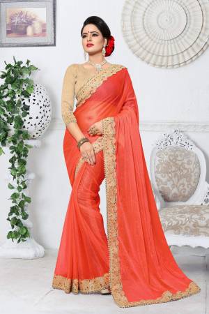 Orange Color Induces Perfect Summery Appeal To Any Outfit, So Grab This Attractive Summer Look Saree In Orange Color Paired With Beige Colored Blouse. This Saree Is Fabricated On Lycra Paired With Gota Fabricated Blouse. It Has Embroidered Lace Border Giving A Heavy Look To The Saree.
