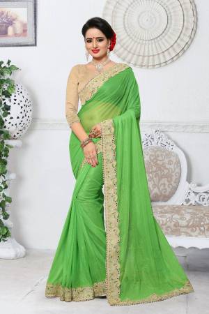 A Very Pretty Shade Is Here With This Saree In Light Green Color Paired With Beige Colored Blouse. This Saree Is Fabricated On Lycra Paired With Gota Fabricated Blouse. It Has Jari Embroidered Lace Border With Stone Work. Buy This Saree Now.