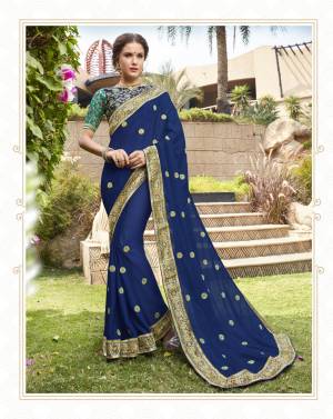 Celebrate This Festive Season With Beauty And Comfort Wearing this Designer Saree In Blue Color Paired With Blue Colored Blouse. This Saree Is Fabricated On Georgette Paired With Jacquard Silk Fabricated Blouse. 
