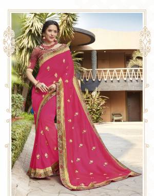 Look Pretty In This Designer Pink Colored Saree Paired With Pink Colored Blouse. This Saree Is Fabricated On Silk Georgette Paired With Art Silk Fabricated Blouse. This Saree Has Pretty Embroidered Motifs All Over With Lace Border.