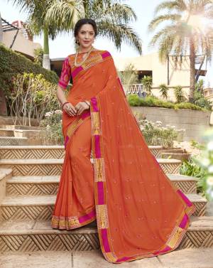 Orange Color Induces Perfect Summery Appeal To Any Outfit, So grab This Designer Saree In Orange Color Paired With Orange Colored Blouse. This Saree Is Fabricated On Silk Georgette Paired With Jacquard Silk Fabricated Blouse. It Is Light Weight And Ensures Superb Comfort all Day Long.