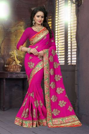 Bright And Visually Appealing Color Is Here With This Heavy Designer Saree In Rani Pink Color Paired With Rani Pink Colored Blouse. This Saree And Blouse are Fabricated On Georgette Beautified With Heavy Work Which Is Making The Saree More Attractive.
