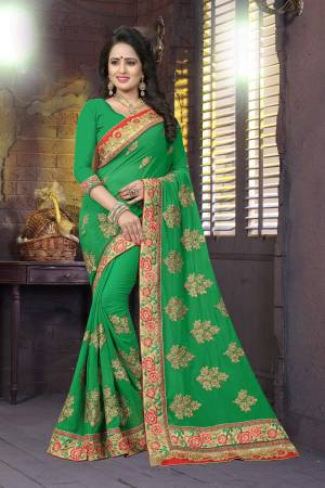 Simple Saree Is Here For Your Social Gatherings Or Festive Wear. Grab This Saree In Green Color Paired With Green Colored Blouse. This Saree And Blouse Are Fabricated On Georgette Beautified With heavy Embroidery. Buy Now.