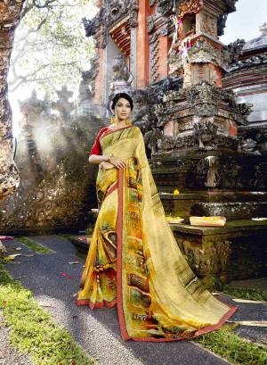 Be It Your Casual Or Semi-Casual Wear, This Saree Is Perfect For All. Grab This Saree In Yellow Color Paired With Contrasting Red Colored Blouse. This Saree Is Fabricated On Georgette Paired With Art Silk Fabricated Blouse.