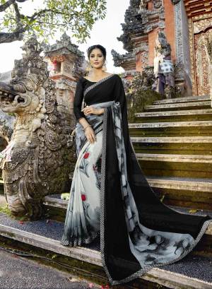 For A Bold And Beautiful Look, Grab This Elegant Looking Saree In Grey Color Paired With Black Colored Blouse. This Saree Is fabricated On Georgette Paired With Art Silk Fabricated Blouse. This Saree Will Definitely Earn You Lots Of Compliments From Onlookers. 