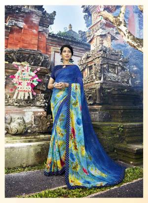 For Your Casual Wear, Grab This Pretty Saree In Blue Color Paired With Blue Colored Blouse. This Saree Is fabricated On Georgette Paired With Art Silk Fabricated Blouse. Its Fabrics Ensures Superb Comfort All Day Long. Buy Now.