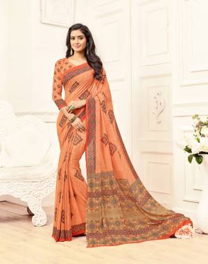 Grab This Pretty Attractive Saree In Light Orange Color Paired WithLight Orange Colored Blouse. This Saree And Blouse are fabricated On Georgette Beautified With Prints All Over It. It Is Light Weight And Ensures Superb Comfort All Day Long.