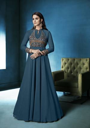 Enhance Your Personality With This Designer Floor Length Readymade Suit In Teal Blue Colored Top Paired With Teal Blue Colored Bottom And Dupatta. Its Top Is Fabricated On Georgette Paired with Santoon Bottom And Chiffon Dupatta. It Has Fully Stitched Top With Unstitced Bottom.