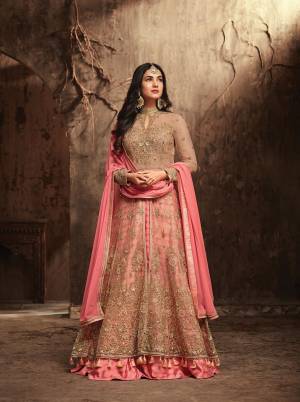 Get Ready For The Upcoming Festive Season With This Designer Indo-Western Suit In Beige Colored Top Paired With Pink Colored Bottom And Dupatta. Its Top IS Fabricated On Net Paired With Art Silk Bottom And Chiffon Dupatta. You Get Its Bottom Stitched As Pants Or Skirt As Per Your Desire. 