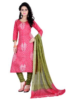 Look Pretty In This Pink Colored Dress Material Paired With Contrasting Olive Green Colored Bottom And Dupatta. This Dress Material Is Fabricated On Satin Cotton Beautified With Bandhani Prints All Over. Buy Now.