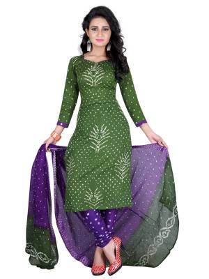 For Your Casual Wear, Grab This Simple Dress Material In Green Colored Top Paired With Contrasting Violet Colored Bottom And Dupatta. This Dress Material Is Fabricated On Satin Cotton Beautified With Bandhani Prints. Its Fabric Is Soft Towards Skin And Easy To carry All Day Long.