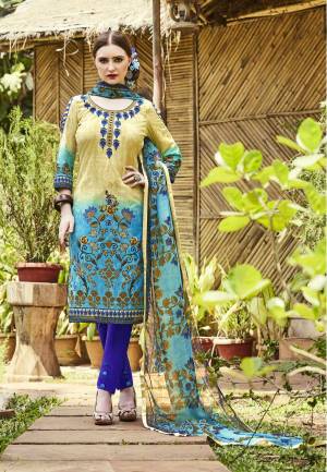Accented with bold floral print , this blue unstitched dress material is a fresh take on contemporary-inspired ethnic trend. Fashioned from cambric cotton with soft chiffon dupatta, this set will ensure a comfortable fit. Complement it with white heels.