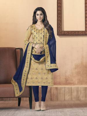 For An Enhanced Look, Grab This Dress Material In Beige Colored Top Paired With Navy Blue Colored Bottom And Dupatta. Its Top Is Fabricated On Silk Jacquard Paired With Cotton Bottom And Chiffon Dupatta. It Is Light In Weight And Easy To Carry All Day Long.