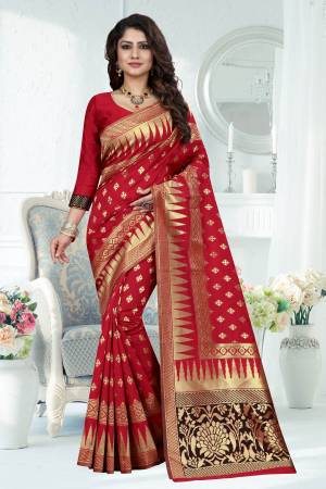 Adorn The Pretty Angelic Look Wearing This Silk Saree In Red Color Paired With Red Colored Blouse. This Saree Is Fabricated On Banarasi Art Silk Paired With Art Silk Fabricated Blouse. This Saree Is Beautified With Weave All Over. Buy Now.