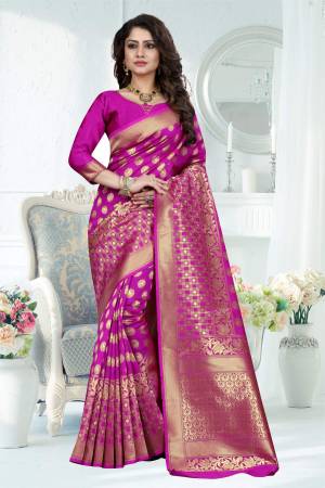 Bright And Visually Appealing Color Is Here With This Silk Saree In Rani Pink Color Paired With Rani Pink Colored Blouse. This Saree Is Fabricated On Banarasi Art Silk Paired With Art Silk Fabricated Blouse. Its Fabric Ensures Superb Comfort And Also It Is Light In Weight And Durable.