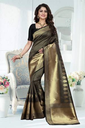 For A Bold And Beautiful Look, Grab This Rich Looking Silk Saree In Black And Gold Paired With Black Colored Blouse. This Saree Is Fabricated On Banarasi Art Silk Paired With Art Silk Fabricated Blouse. It Is Light In Weight And Easy To Carry All Day Long.