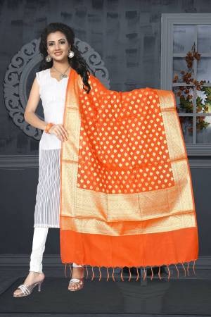 This Festive Season Grab Every Ones Attention With This Attractive Orange Colored Dupatta Fabricated On Banarasi Art Silk. This Dupatta Is Light Weight And Easy To Carry All Day Long.