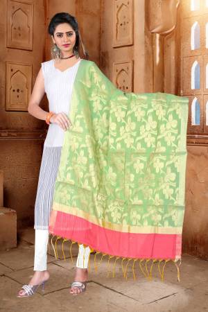 This Season Is About Subtle Shades And Pastel Play, So Grab This Pretty Dupatta In Pastel Green Color Fabricated On Banarasi Art Silk Beautified With Weave All Over It. 
