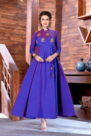 Bright And Visually Appealing Color Is Here With This Designer Floor Length Readymade Gown In Violet Color Fabricated On Art Silk. It Has Embroidered Motifs Over The Yoke. Buy Now.