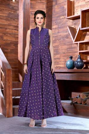 You Will Definitely Earn Lots Of Compliments Wearing This Designer Floor Length Readymade Gown In Dark Purple Color Fabricated On Art Silk. It Has Pretty Small Embroidred Motifs All Over It. Buy Now.