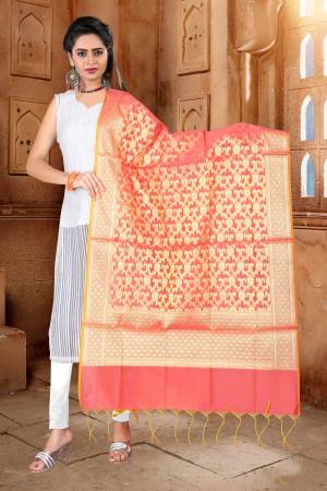 Give A Pretty Glam Look To Your Personality, Adding It With This Lovely Pink Colored Dupatta. It Is Fabricated On Banarasi Art Silk Beautified With Weave. Pair It With Any Contrasting Colored Suit Or Kurti.