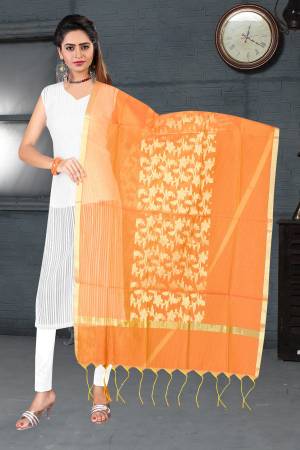 Bright And Visually Appealing Color Is Here With This Dupatta In Orange Color Fabricated On Banarasi Art Silk Beautified With Weave. Pair This Up With Contrasting Color Kurti. 