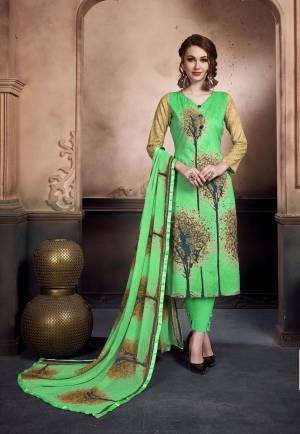 Add This Pretty Dress Material To Your Wardrobe On Green Color And Get This Stitched As Per Your Desired Fit And Comfort. This Dress Material Is Fabricated On Cotton Paired With Chiffon Dupatta. Buy Now.