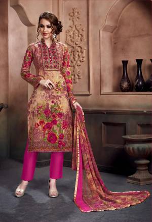 Go Colorful Wearing This Suit In Multi Colored Top Paired With Pink Colored Bottom And Multi Colored Dupatta. Its Top And Bottom Are Fabricated On Cotton Paired With Chiffon Dupatta. Buy This Dress Material Now.
