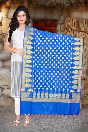 For That Simple White Color Kurti, Grab This Pretty Dupatta In Blue Color Fabricated On Banarasi Art Silk Beautified With Weave All Over. This Dupatta Is Light Weight And Easy To Carry All Day Long.