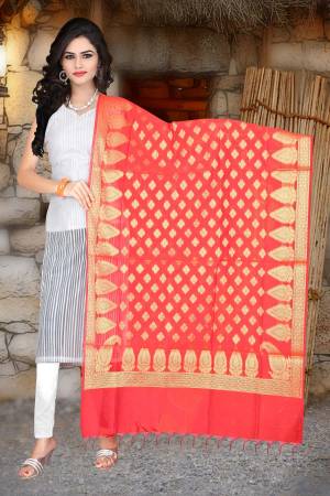 Give A Pure Traditional Look With This Lovely Dark Peach Colored Dupatta Fabricated On Banarasi Art Silk, This Dupatta Can Be Paired With Any Contrasting Colored Kurti Or Suit.