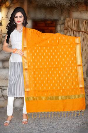 Celebrate This Festive Season Pairing Your Simple Dress With This Attractive Musturd Yellow Colored Dupatta. This Dupatta IS Fabricated On Banarasi Art Silk Beautified With Weave. 