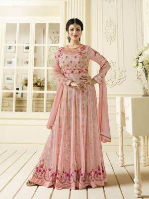 Look Pretty Wearing This Beautiful Designer Floor Length Suit In Baby Pink Color Paired With Baby Pink Colored Bottom And Dupatta. Its Top Is Fabricated On Georgette Paired With Santoon Bottom And Chiffon Dupatta, Also Its Has Very Pretty Floral Printed Satin Fabricated Inner. Buy This Semi-Stitched Suit Now.
