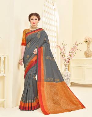 Flaunt Your Rich And Elegant Taste Wearing This Saree In Grey Color Paired With Rust Orange Colored Blouse. This Saree Is Fabricated On Art Silk Paired With Brocade Fabricated Blouse. This Saree Is Light Weight And Gives A Rich Look To Your Personality.