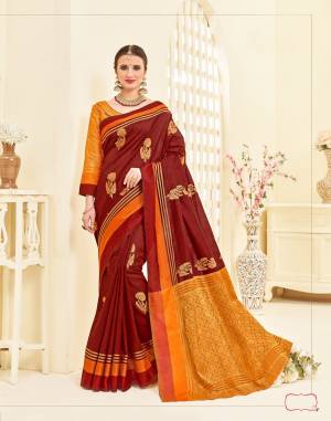 For A Royal Look, Grab This Attractive Saree In Maroon Color Paired With Yellow And Gold Blouse. This Saree Is Fabricated On Art Sik Paired With Brocade Fabricated Blouse. Its Fabric Ensures Superb Comfort all Day Long. Buy This Saree Now.