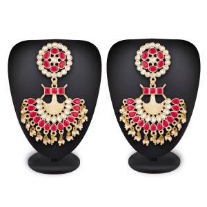 For That Lovely Pink Dress, Grab This Lovely Pair Of Earrings In Golden Color Beautified With Pink And White Colored Stone Work. Buy This Lovely Pair Now.
