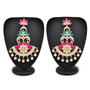 You Will Definitely Earn Lots Of Compliments Wearing This Lovely Pair Of Earrings In Golden Color Beautified With Stone Work. 