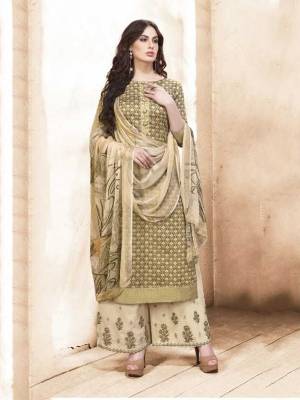 Grab This Pretty Designer Semi-Stitched Suit In Olive Green Colored Top Paired With Cream Colored Bottom And Olive Green Colored Dupatta. Its Top Is Fabricated On Silk Cotton Paired With Satin Cotton Bottom And Chiffon Dupatta. Its all Three Fabrics Ensures Superb Comfort All Day Long.