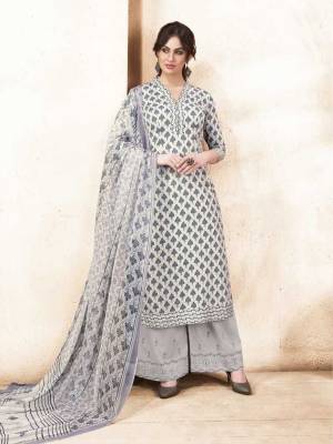 Simple And Elegant Looking Designer Semi-Stitched Suit Is Here In Grey Color Paired With Grey Colored Bottom And Dupatta. Its Top Is Fabricated On Silk Cotton Cotton Paired With Satin Cotton Bottom And Chiffon Dupatta. Its All Three Fabrics Ensures Superb Comfort All Day Long.