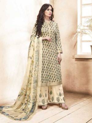 Flaunt Your Rich and Elegant Taste Wearing This Designer Semi-Stitched Suit In Beige Color. Its Top Is Fabricated On Silk Cotton Paired With Satin Cotton Bottom And Chiffon Dupatta. It IS Light Weight And easy To Carry All Day Long. Buy Now.