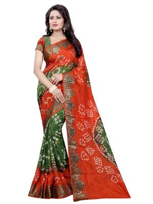 Here Is A Perfect Traditional Look With This Saree In Orange and Green Color Paired With Green Colored Blouse. This Saree And Blouse Are Fabricated On Art Silk Beautified With Bandhani Prints All Over. Buy This Saree Now.