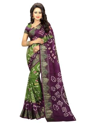 You Will Definitely Earn Lots Of Compliments Wearing This Saree In Purple And Green Color Paired With Purple Colored Blouse. This Saree And Blouse Are Fabricated On Art Silk Beautified With Bandhani Prints Which Gives A Traditional Look To Your Personality.