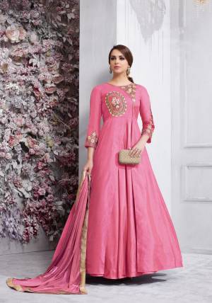 Bright And Visually Appealing Color Is Here With This Designer Floor Length Suit In Pink Colored Top Paired With Pink Colored Bottom And Dupatta. Its Top Is Fabricated On Art Silk Paired With Santoon Bottom And Chiffon Dupatta. Buy This Readymade Suit Now.