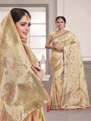 Simple, Rich And Elegant Looking Saree Is Here In Cream Color Paired With Cream Colored Blouse. This Saree And Blouse Are Fabricated On Art Silk Beautified With Weaving And Lace Border. Buy This Simple Saree Now.