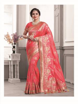 New And Unique Shade In Pink Is Here With This Saree In Old Rose Pink Color Paired With Old Rose Pink Colored Blouse. This Saree And Blouse Are Fabricated On Art Silk Beautified With Weave And Lace Border.