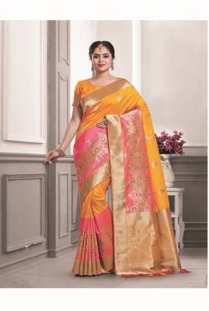 Celebrate This Festive Season Wearing This Beautiful Attractive Saree In Yellow And Pink Color Paired With Yellow Colored Blouse. This Saree And Blouse Are Fabricated On Art Silk Beautified With Weave. Buy Now.