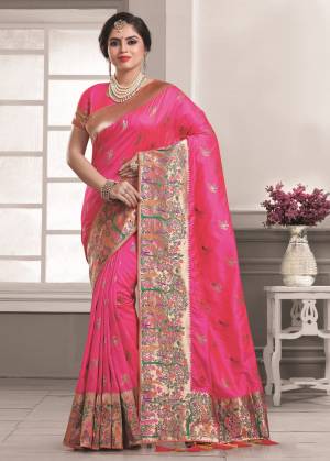 Bright And Visually Appealing Color Is Here With This Saree In Fuschia Pink Color Paired With Fuschia Pink Colored Blouse. This Saree And Blouse Are Fabricated On Art Silk Beautified With Attractive Multi Colored Weave. Buy Now.